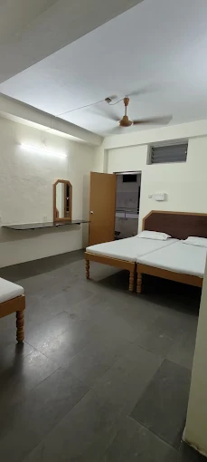 Three bedded room with 3 beds at Hotel Bhavani Udupi